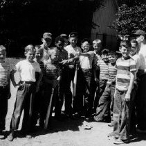 Schoolboys get ready to play a game of softball as part of Coach Barnabo's